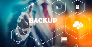 businessman selecting "backup" from modern virtual interface