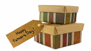 two presents stacked with a "Happy Father's Day" tag