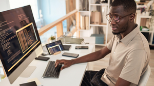 software developer working at his workstation