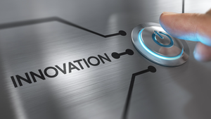 person pressing an "Innovation" on button